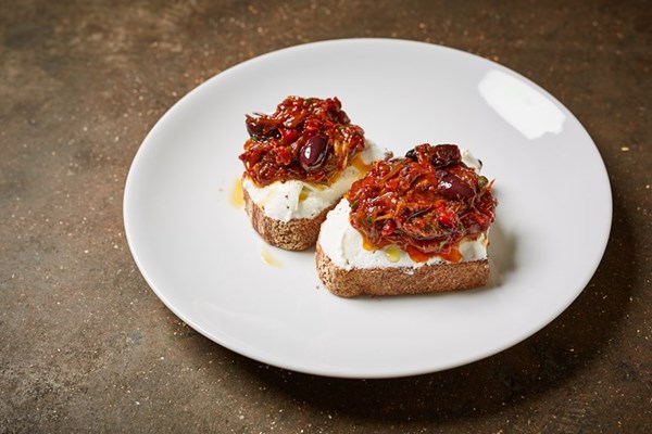 Fettunta with roasted peppers and goat’s curd