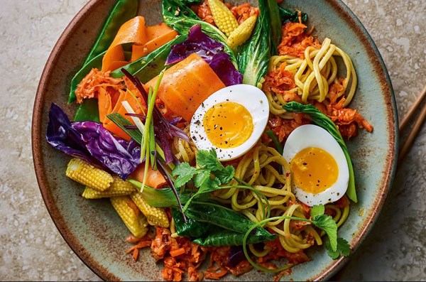 Fiery kimchi noodle stir fry with soft-boiled eggs