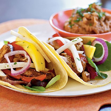 Fiesta chicken tacos with mango and jicama salad