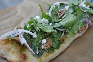 Figgy pizza with arugula and goat cheese