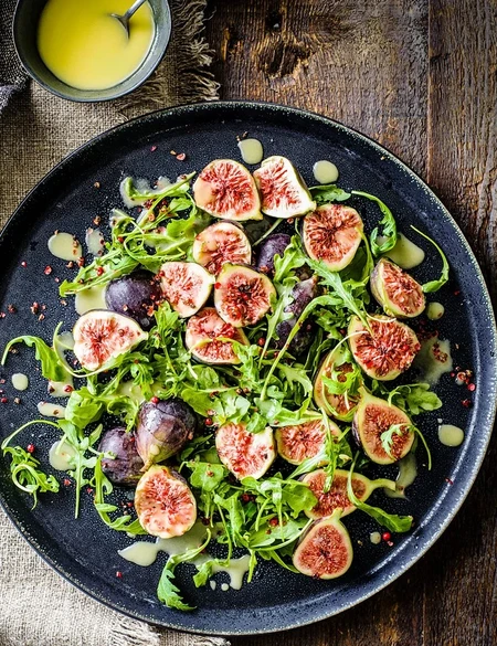 Figs with grana padano and pink peppercorn dressing