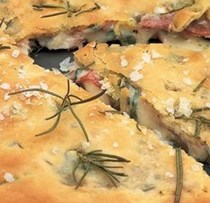 Filled focaccia with ham and melted Fontina