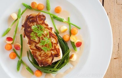 Fillet of Alaska halibut with potato crust and cider cream sauce