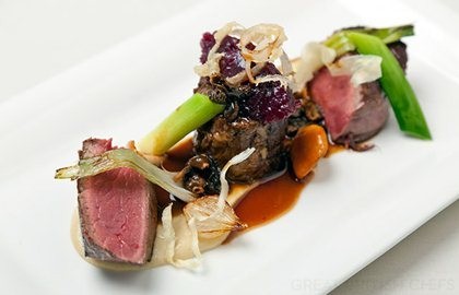 Fillet of beef with braised oxtail, textures of onion and morel Madeira sauce