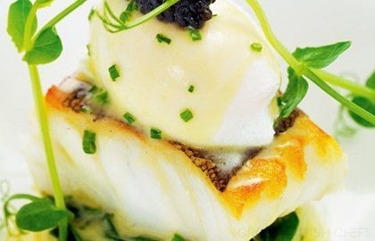 Fillet of cod with poached hen's egg, crushed Jersey Royals and chive butter sauce