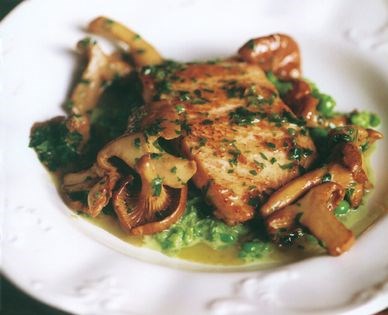 Fillet of sea trout with crushed peas and girolles