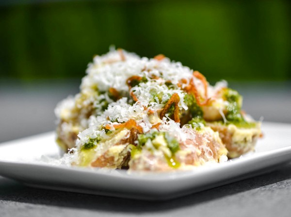 Fingerling potato salad with aioli, pesto, fried shallots, and pecorino