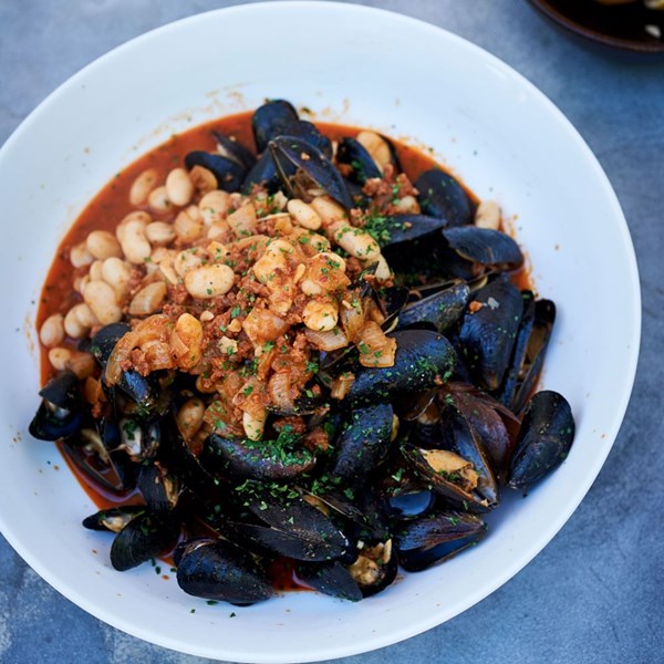 Fino-steamed mussels with chorizo and white beans
