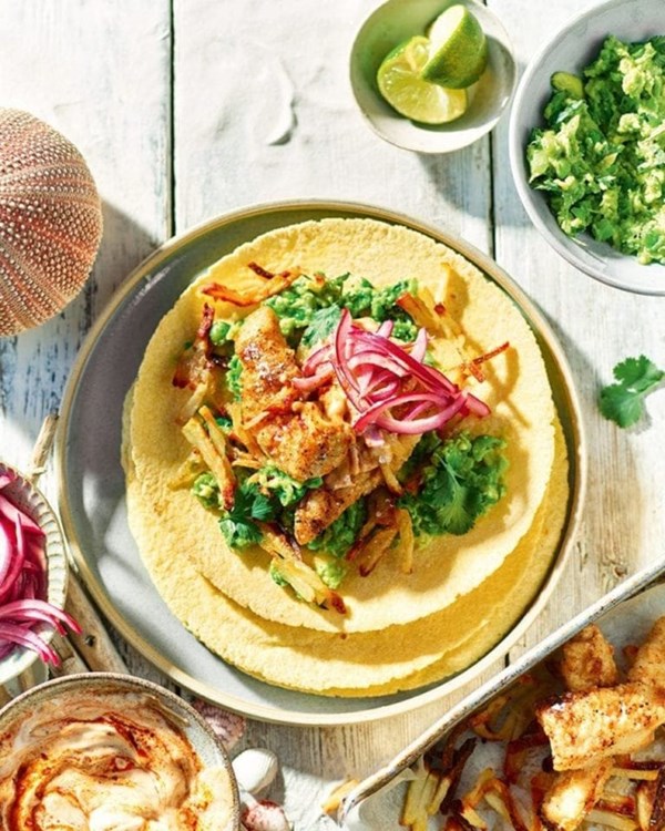 Fish and chip tacos with pea guacamole