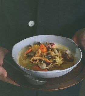 Fish and shellfish saffron and coconut stew with spice-roasted pumpkin
