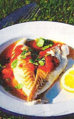 Fish baked in newspaper