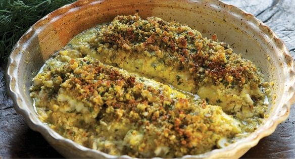 Fish baked in yogurt with walnut and dill topping