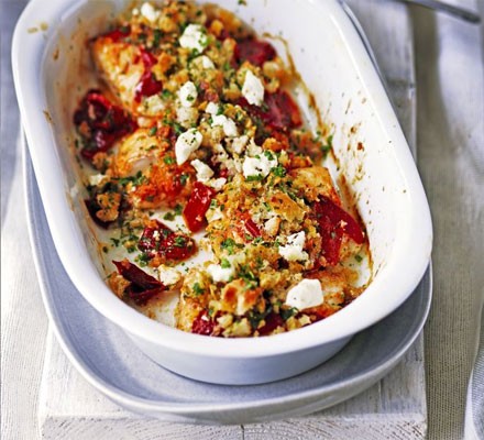 Fish baked with roasted peppers and feta