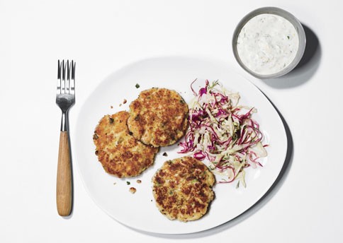 Fish cakes with coleslaw and horseradish-dill sauce