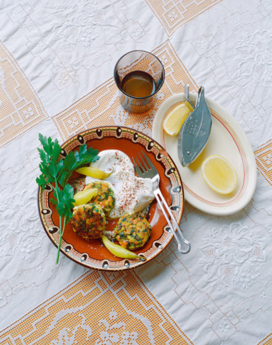 Fish cakes with green herbs and labneh