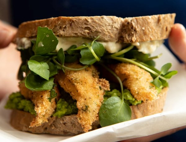 Fish finger sandwich with mint pea puree and tartare sauce