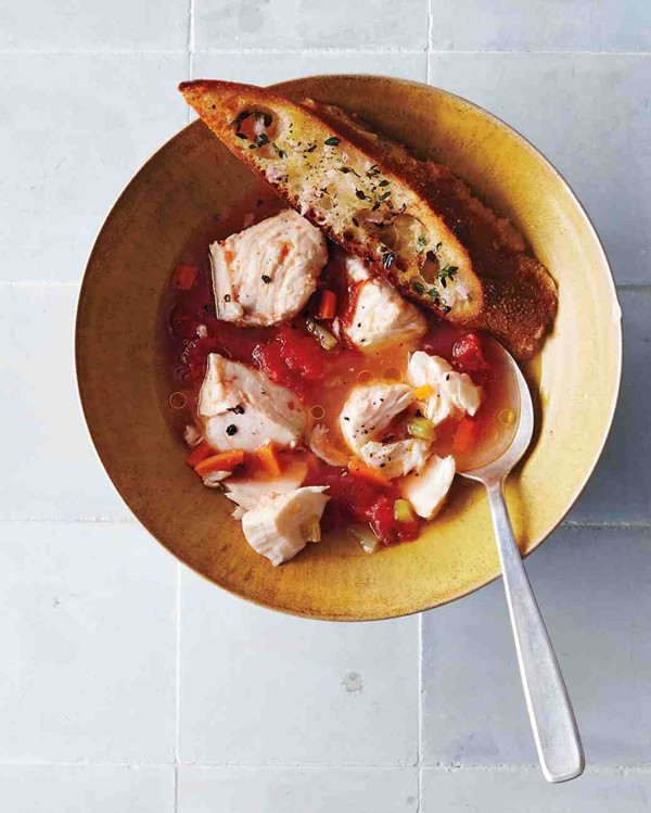 Fish stew with herbed toasts