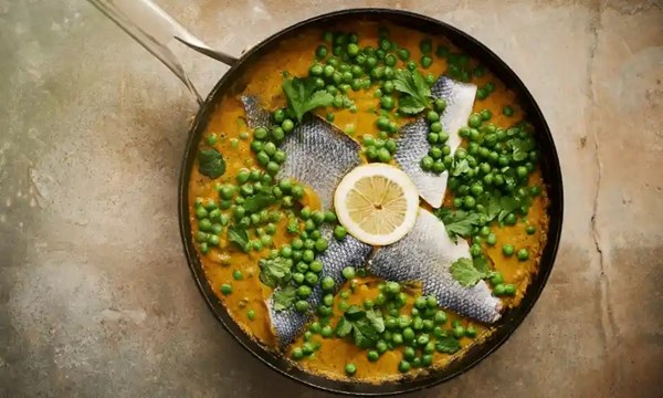 Fish tagine with potatoes, peas and coriander