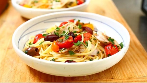 Fish with capers, spaghetti and olives