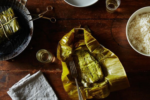 Fish with green masala and coconut wrapped in banana Leaves