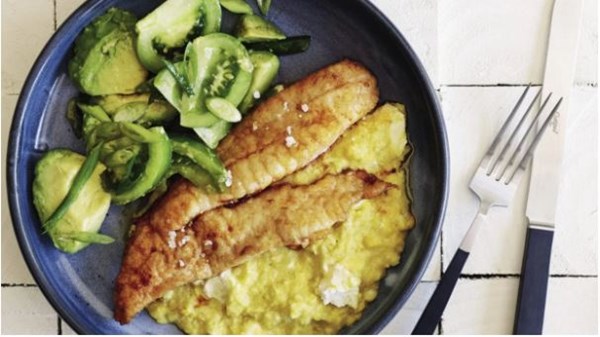 Fish with sweetcorn and feta smash and green tomato salad