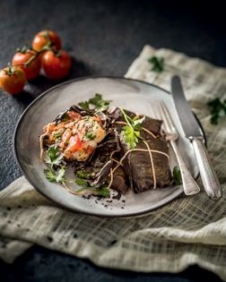 Fish wrapped in banana leaves