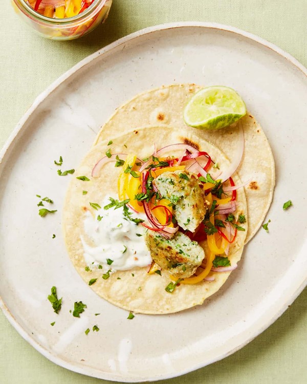 Fishcake tacos with mango and lime and cumin yoghurt