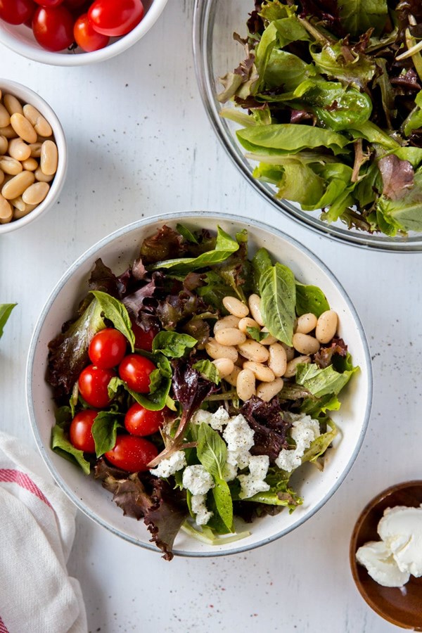 Five minute salad with goat cheese, basil and white beans