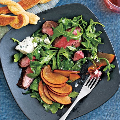 Flank steak salad with plums and blue cheese