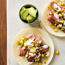 Flank-steak tacos with charred corn salsa