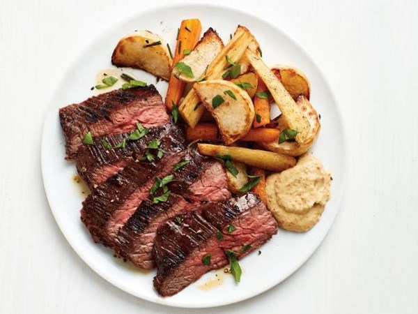Flank steak with roasted root vegetables 
