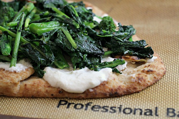 Flatbread pizza with broccoli rabe and ricotta