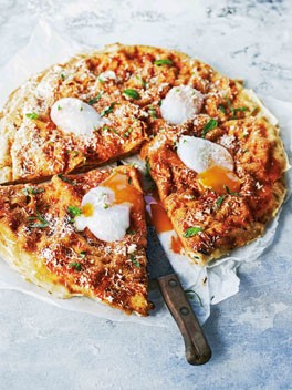 Flatbread stack with tomato sauce and poached eggs (Pane frattau)