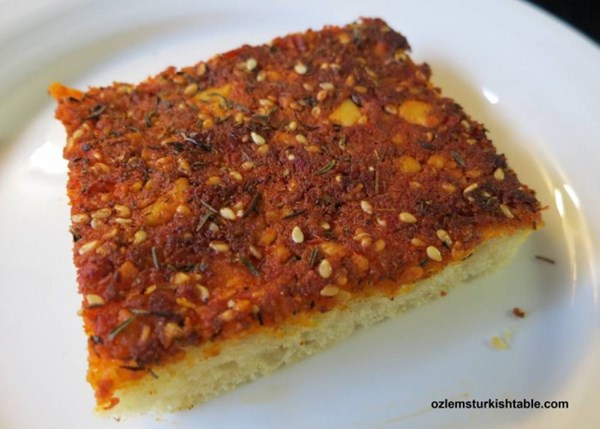 Flatbread with feta, zahtar and red pepper paste (Biberli ekmek)