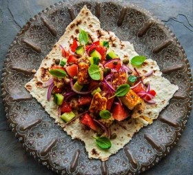 Flatbread with watermelon panzanella, halloumi and sumac dressing