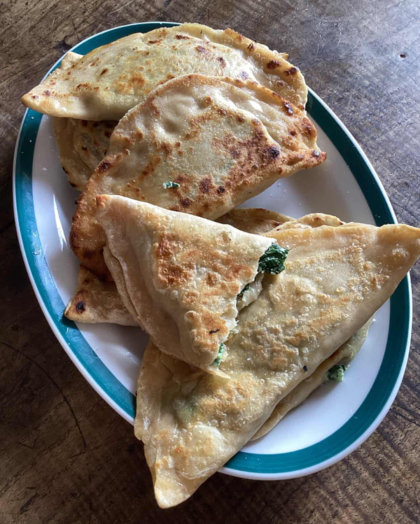 Flatbreads stuffed with spinach and cheese