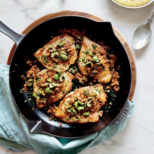 Flattened chicken with almond and paprika vinaigrette