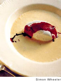Floating islands with black currant sauce