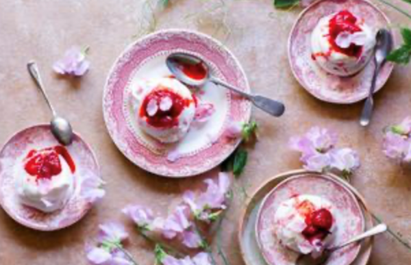 Floral meringues with whipped yoghurt cream and roasted strawberries