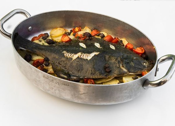 Flounder with potatoes, olives, tomatoes and capers