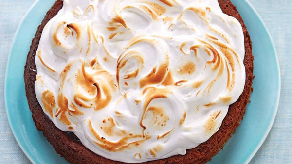 Flourless chocolate-almond torte with cherry preserves and kirsch meringue