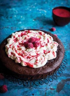 Flourless chocolate cake with raspberry coulis