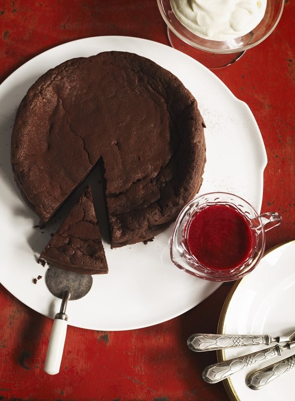 Flourless chocolate cake with raspberry coulis