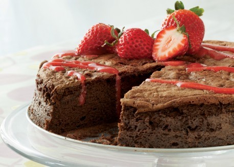 Flourless chocolate cake with strawberry coulis