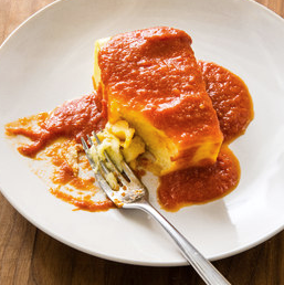 Fluffy baked polenta with red sauce