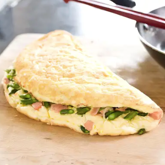 Fluffy omelet with smoked salmon and asparagus