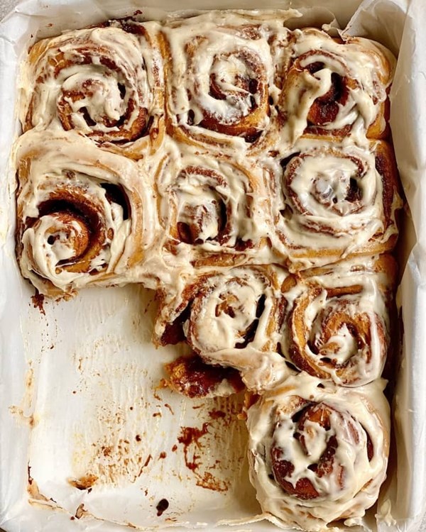 Fluffy pumpkin cinnamon rolls with maple icing