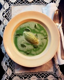 Foamy garden pea soup with basil and avocado cream