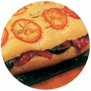 Focaccia sandwich with roasted vegetables, tapenade and goats' cheese