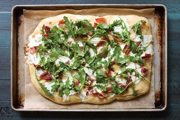 Focaccia with burrata, prosciutto, and arugula